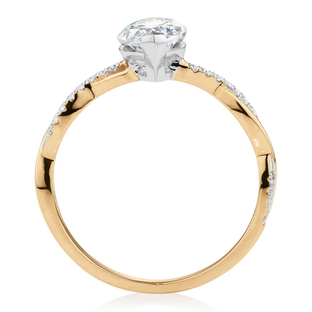 Marquise and Round Brilliant shouldered engagement ring with 1.74 carats* of diamond simulants in 14 carat yellow and white gold