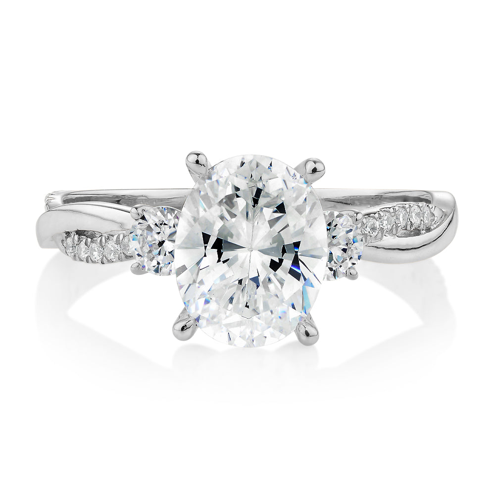Oval and Round Brilliant shouldered engagement ring with 2.17 carats* of diamond simulants in 14 carat white gold