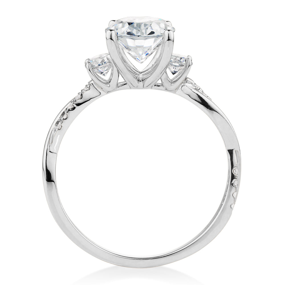 Oval and Round Brilliant shouldered engagement ring with 2.17 carats* of diamond simulants in 14 carat white gold