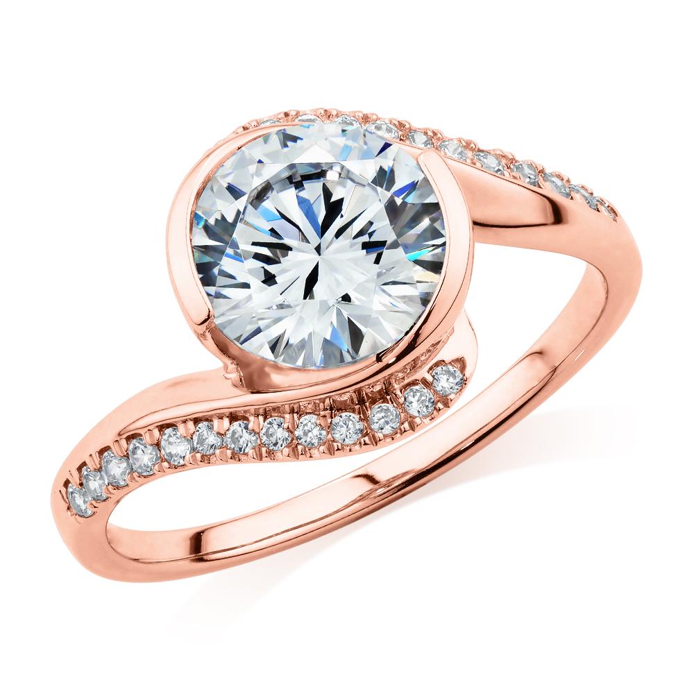 Round Brilliant shouldered engagement ring with 2.19 carats* of diamond simulants in 14 carat rose gold