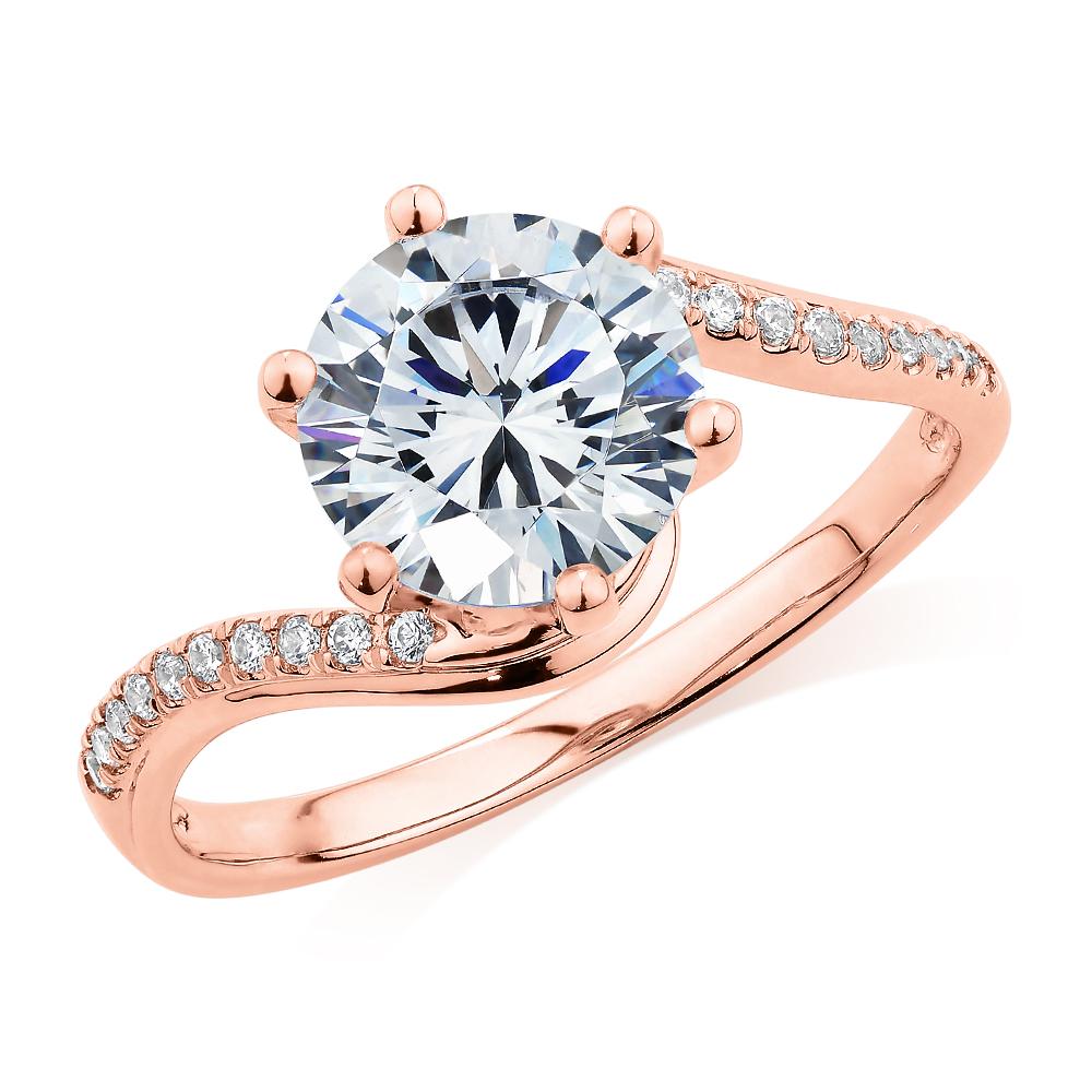 Round Brilliant shouldered engagement ring with 2.14 carats* of diamond simulants in 14 carat rose gold