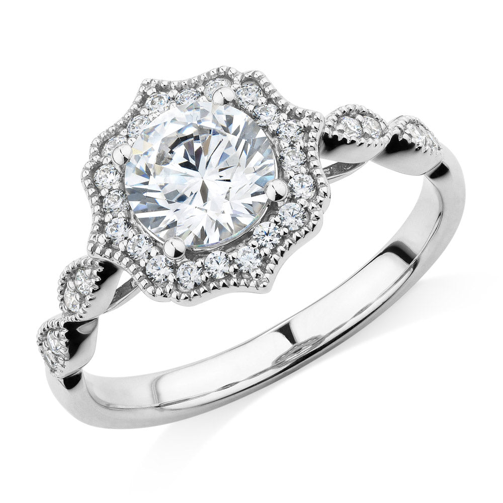 Round Brilliant halo engagement ring with 1.22 carats* of diamond simulants in 14 carat white gold