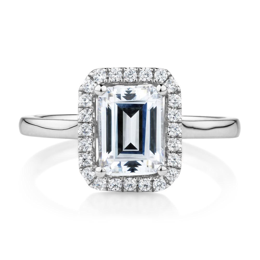 Emerald Cut and Round Brilliant halo engagement ring with 1.92 carats* of diamond simulants in 14 carat white gold
