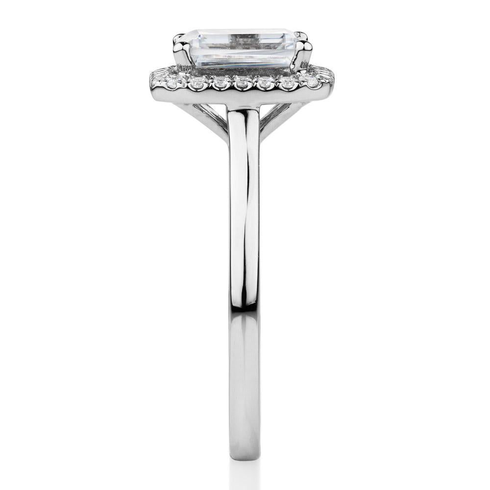 Emerald Cut and Round Brilliant halo engagement ring with 1.92 carats* of diamond simulants in 14 carat white gold