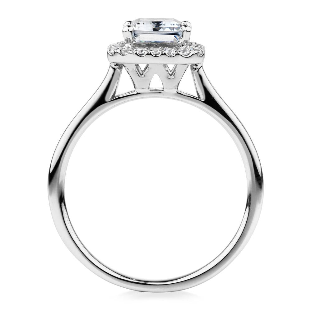 Emerald Cut and Round Brilliant halo engagement ring with 1.92 carats* of diamond simulants in 14 carat white gold