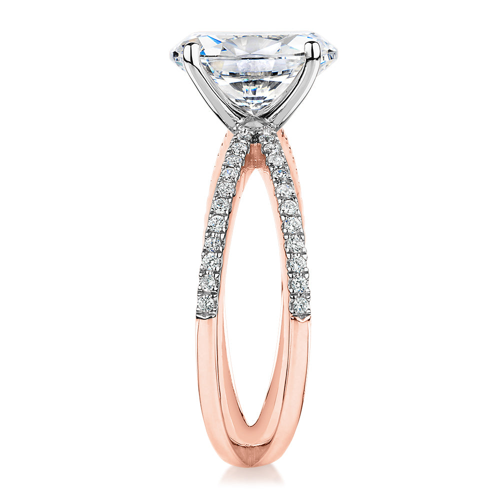 Oval and Round Brilliant shouldered engagement ring with 2.76 carats* of diamond simulants in 14 carat rose and white gold