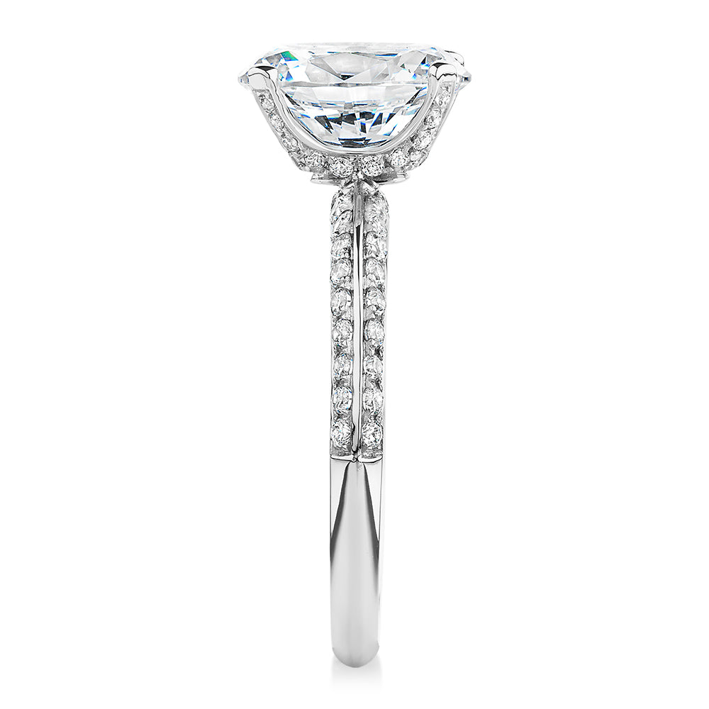 Oval shouldered engagement ring with 2.97 carats* of diamond simulants in 14 carat white gold