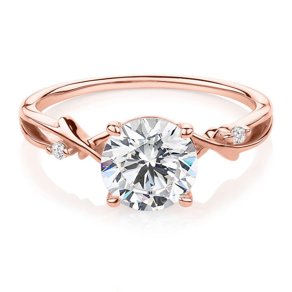 Round Brilliant shouldered engagement ring with 1.69 carats* of diamond simulants in 14 carat rose gold