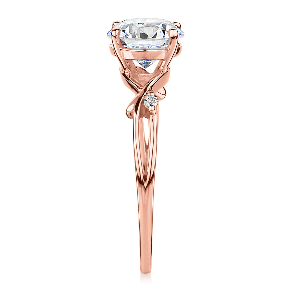 Round Brilliant shouldered engagement ring with 1.69 carats* of diamond simulants in 14 carat rose gold