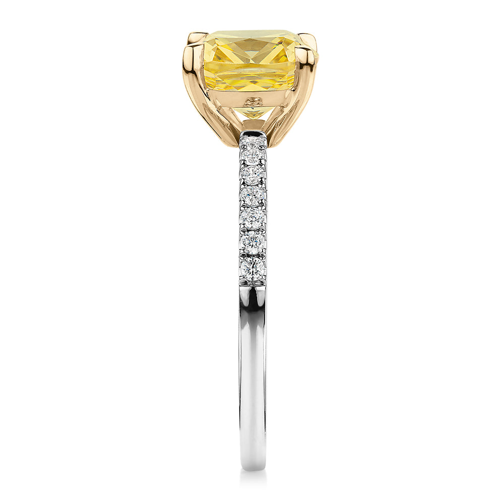 Cushion and Round Brilliant shouldered engagement ring with 2.18 carats* of diamond simulants in 10 carat white and yellow gold