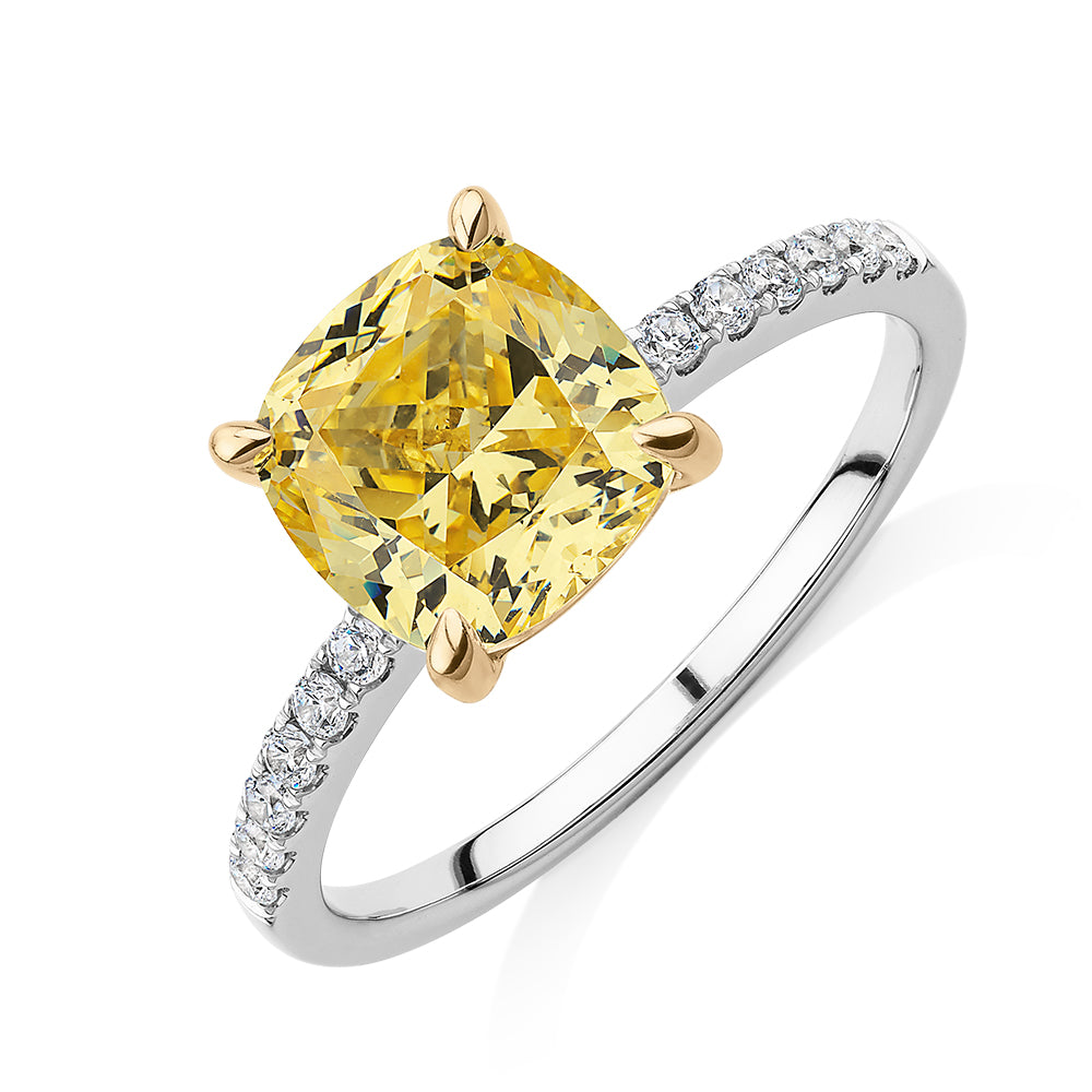 Cushion and Round Brilliant shouldered engagement ring with 2.18 carats* of diamond simulants in 10 carat white and yellow gold