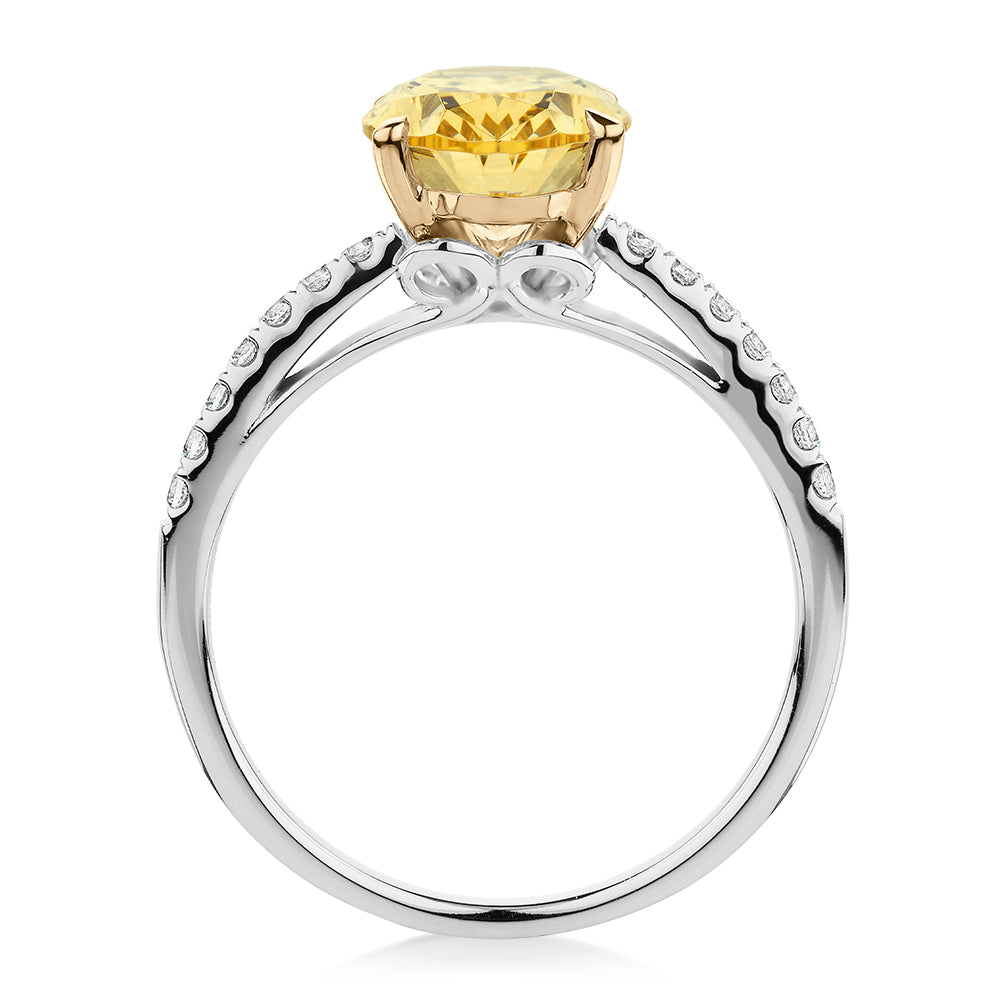 Oval and Round Brilliant shouldered engagement ring with 2.68 carats* of diamond simulants in 10 carat white and yellow gold