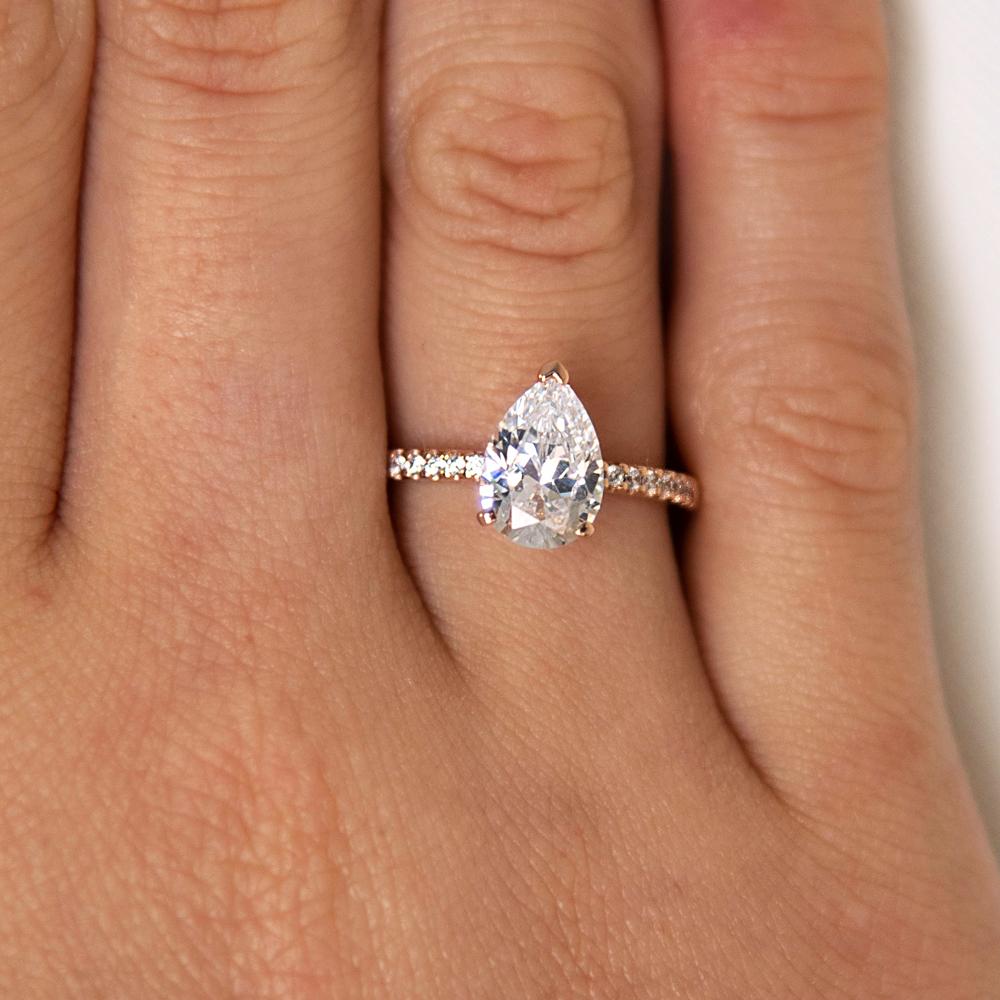 Pear and Round Brilliant shouldered engagement ring with 1.88 carats* of diamond simulants in 14 carat rose gold
