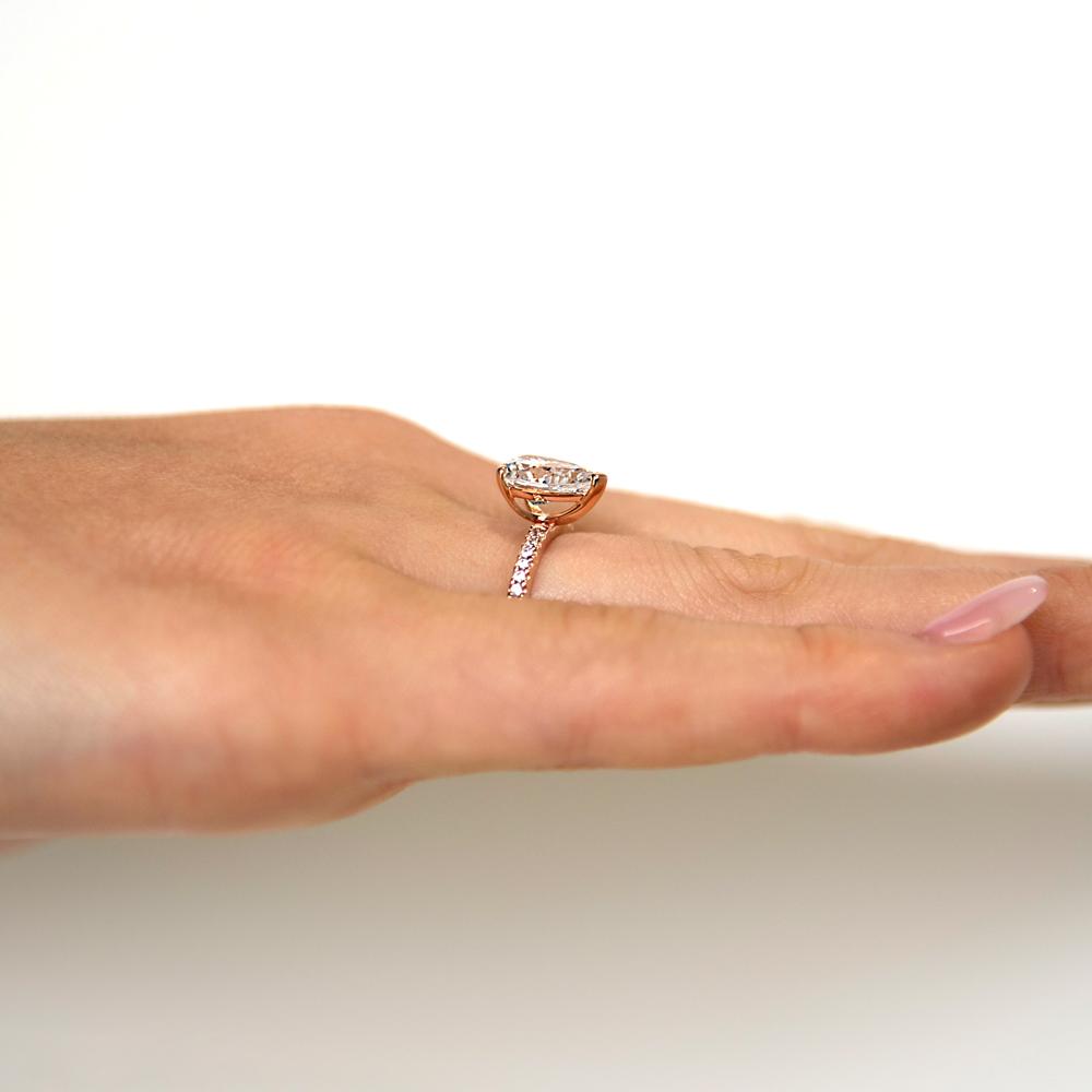 Pear and Round Brilliant shouldered engagement ring with 1.88 carats* of diamond simulants in 14 carat rose gold