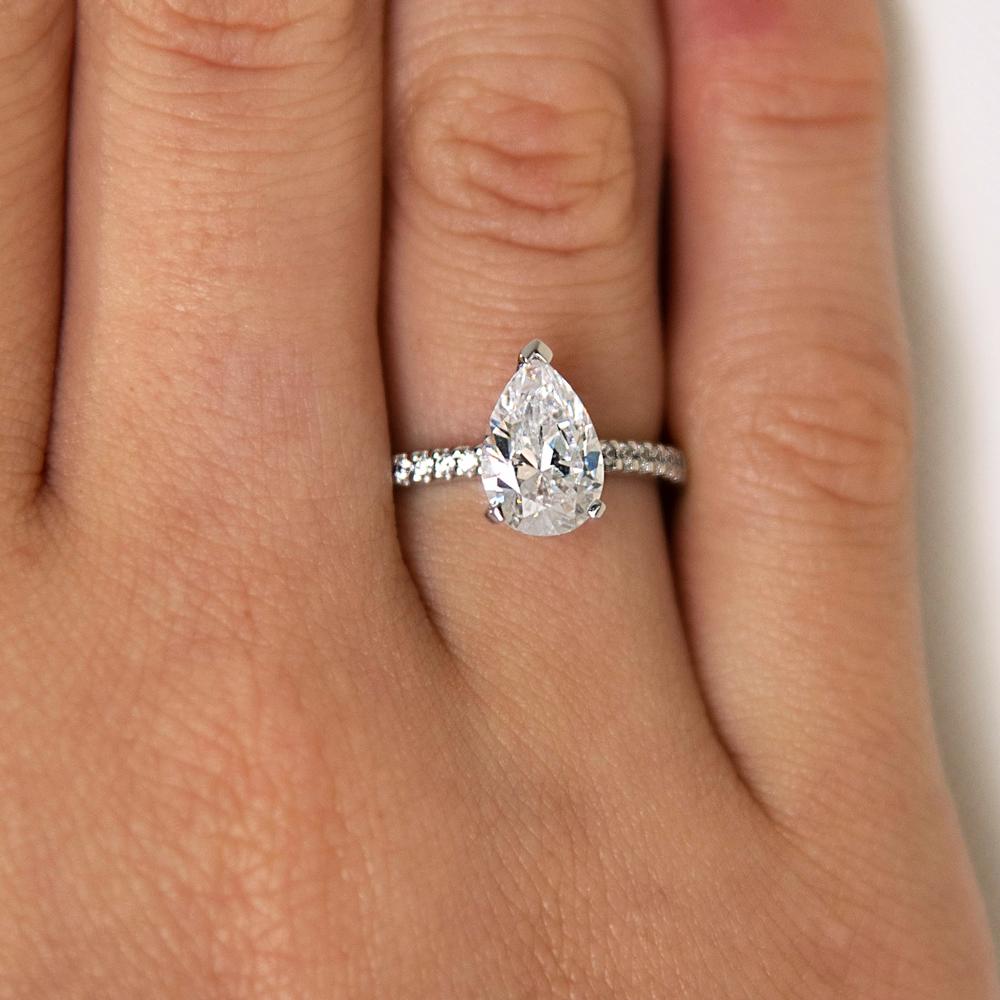 Pear and Round Brilliant shouldered engagement ring with 1.88 carats* of diamond simulants in 14 carat white gold