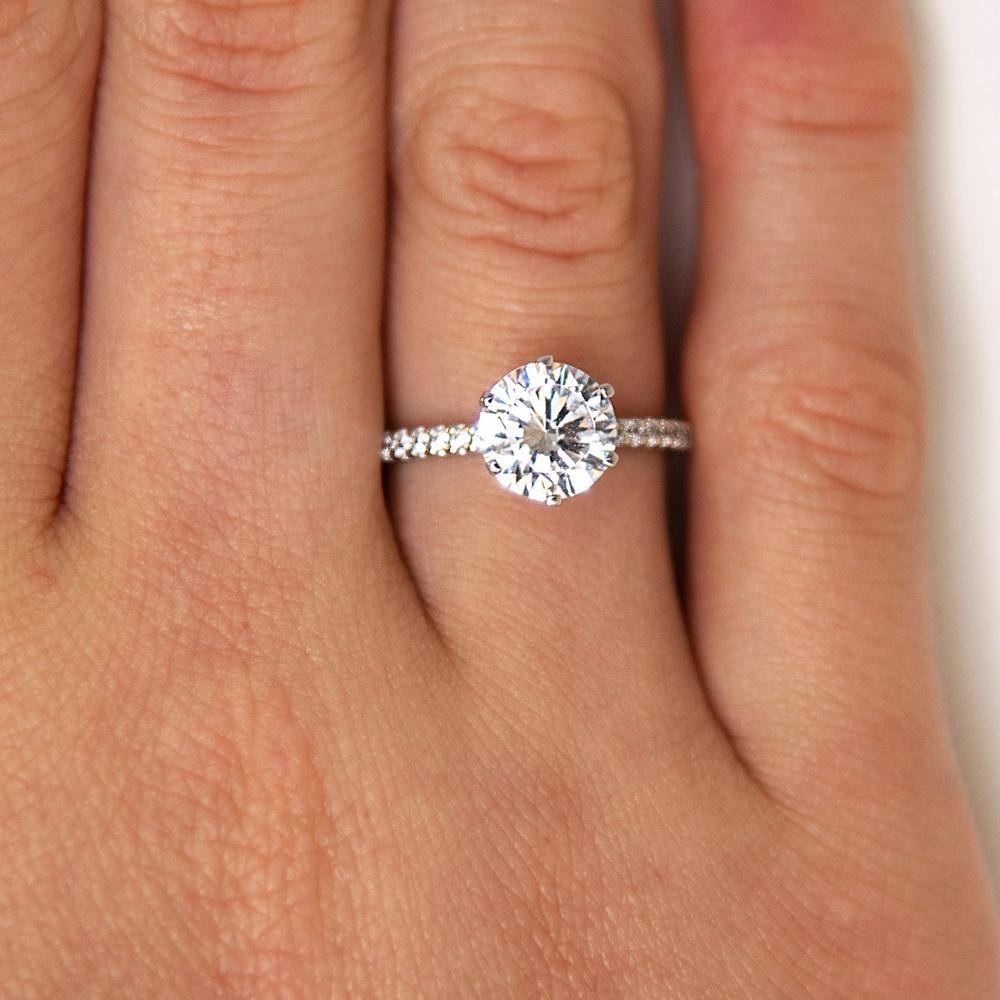 Round Brilliant shouldered engagement ring with 2.12 carats* of diamond simulants in 14 carat white gold