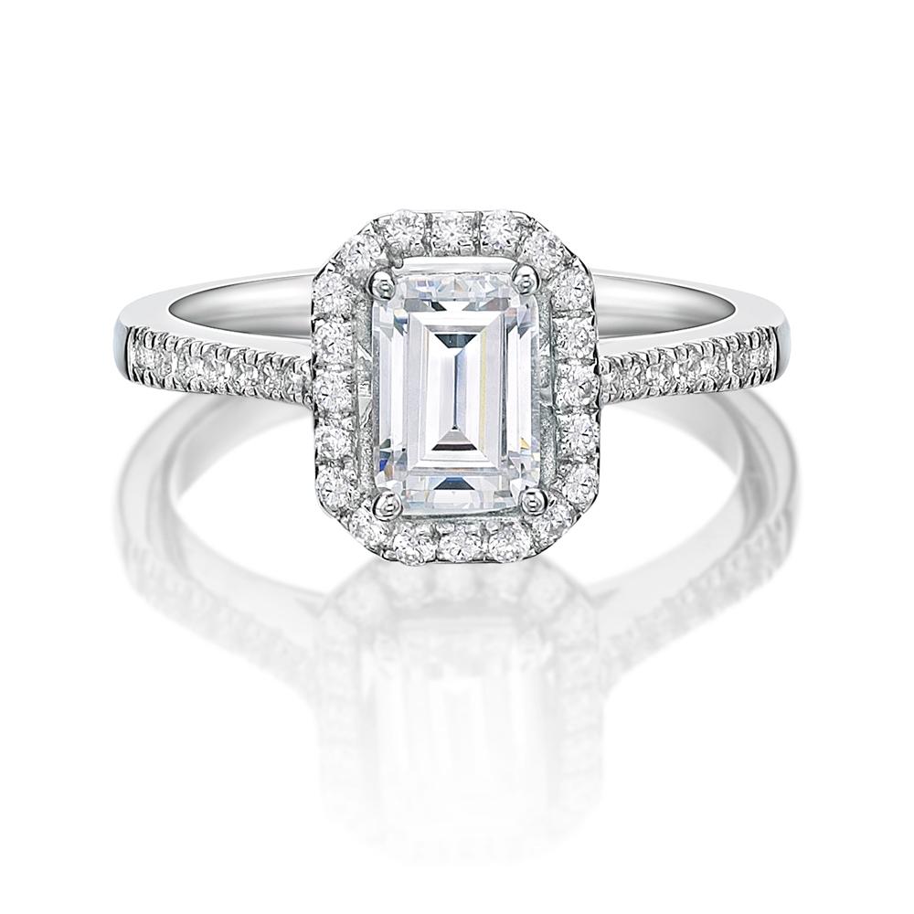 Emerald Cut and Round Brilliant halo engagement ring with 1.29 carats* of diamond simulants in 14 carat white gold