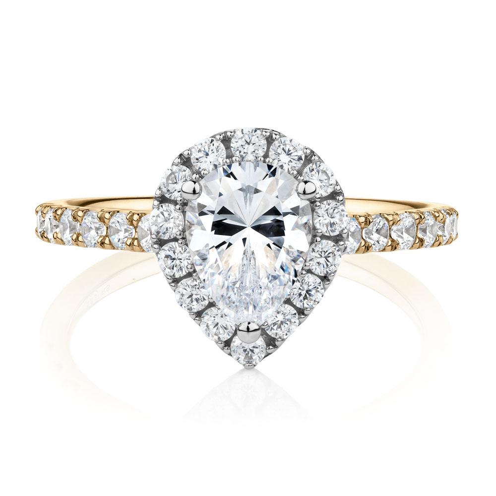 Pear and Round Brilliant halo engagement ring with 1.83 carats* of diamond simulants in 14 carat yellow and white gold