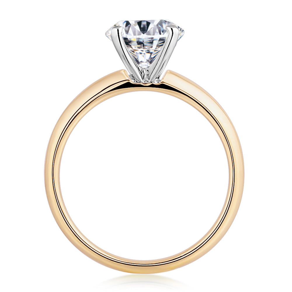 Oval solitaire engagement ring with 2.54 carat* diamond simulant in 14 carat yellow and white gold