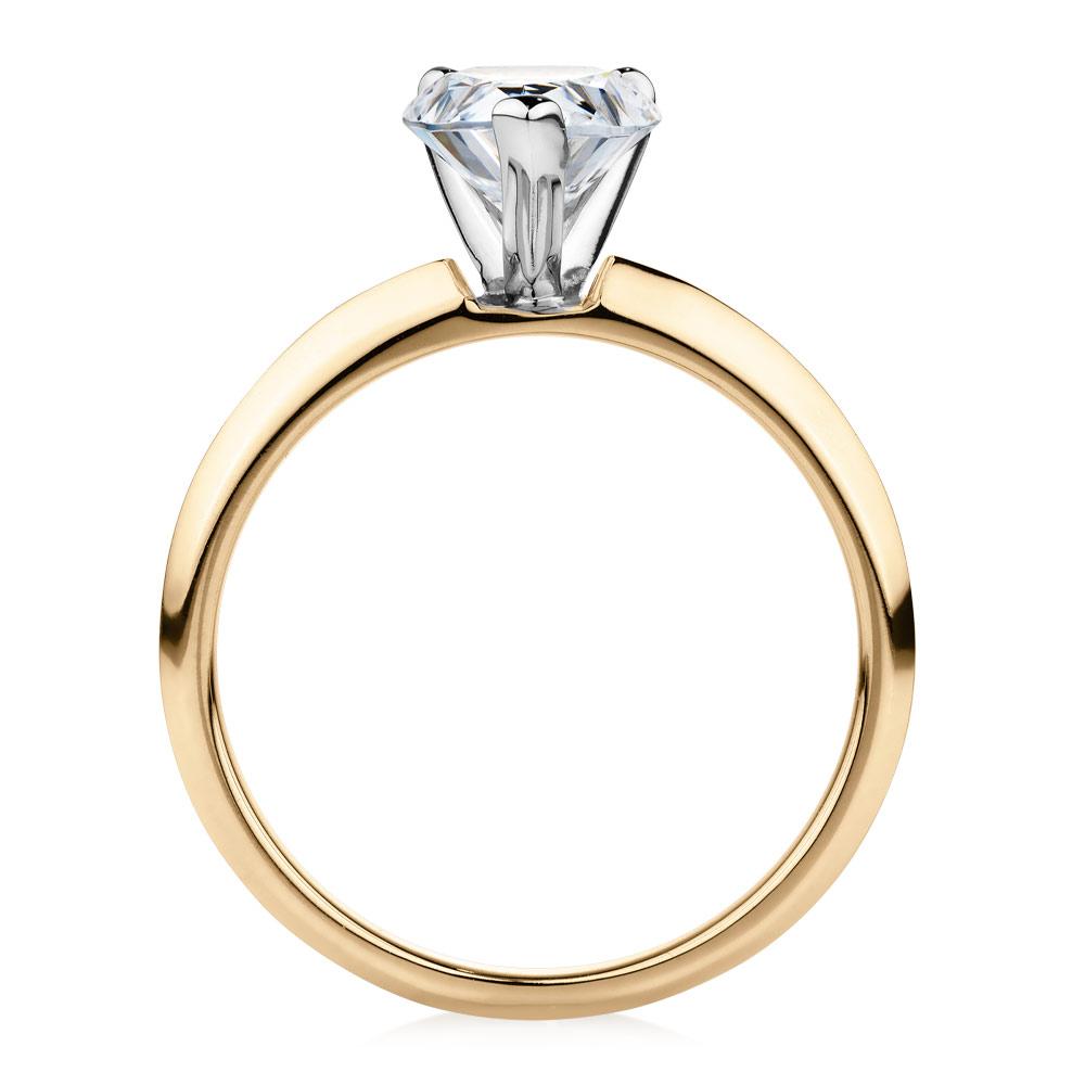 Pear solitaire engagement ring with 1.8 carat* diamond simulant in 14 carat yellow and white gold