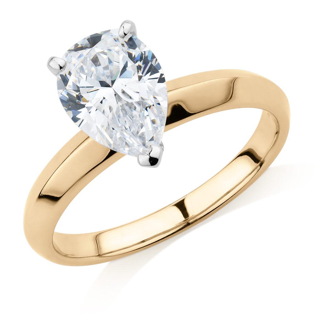 Pear solitaire engagement ring with 1.8 carat* diamond simulant in 14 carat yellow and white gold