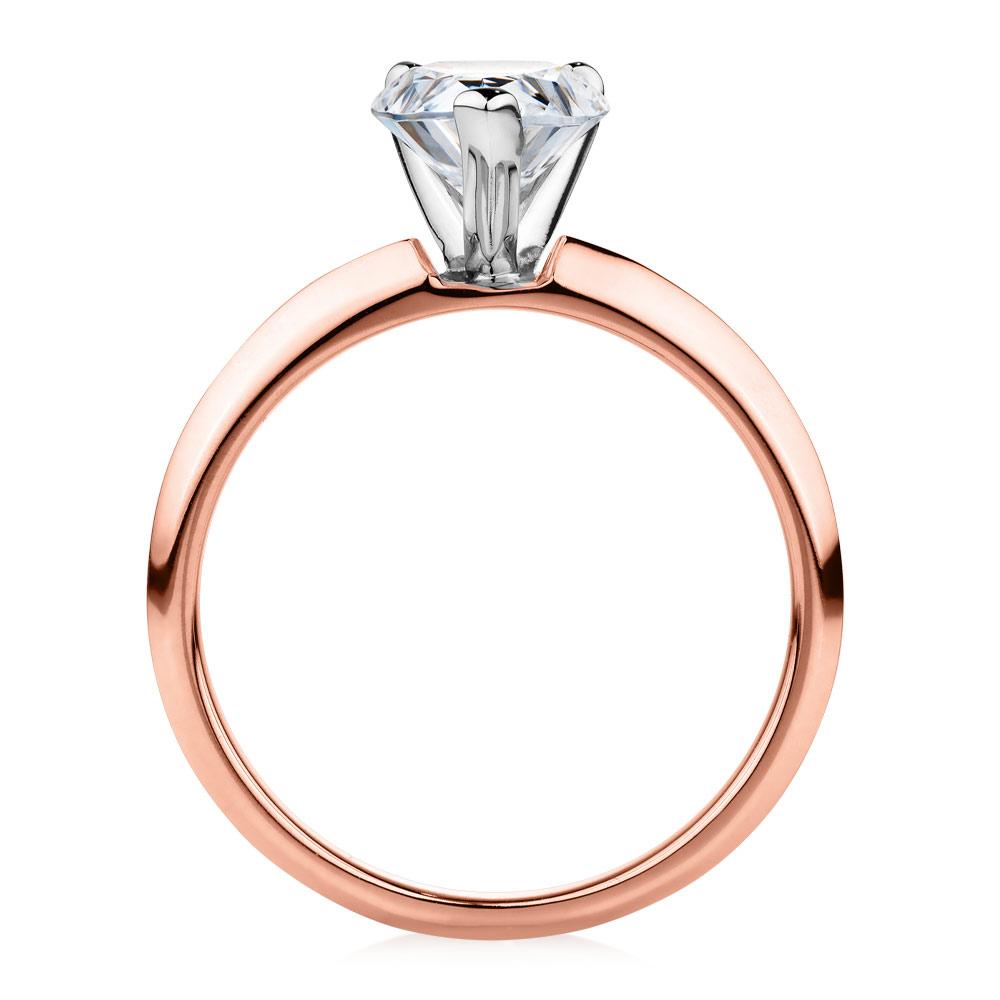 Pear solitaire engagement ring with 1.8 carat* diamond simulant in 14 carat rose and white gold