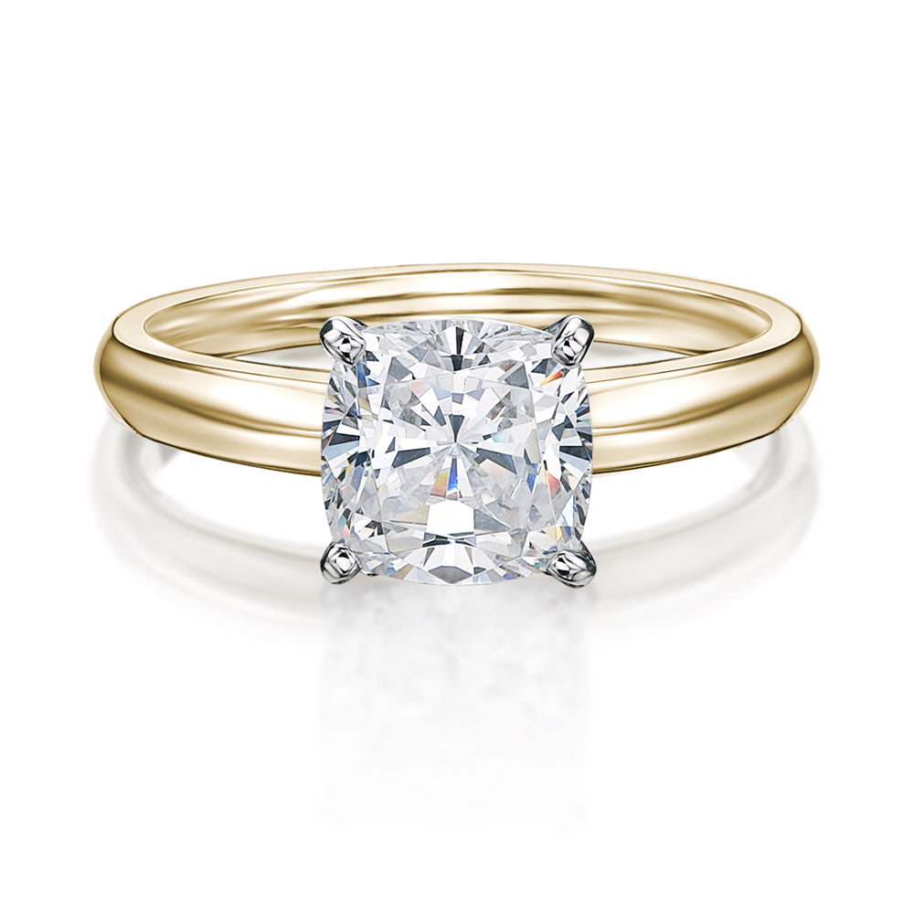 Cushion solitaire engagement ring with carat* diamond simulant in 14 carat yellow and white gold