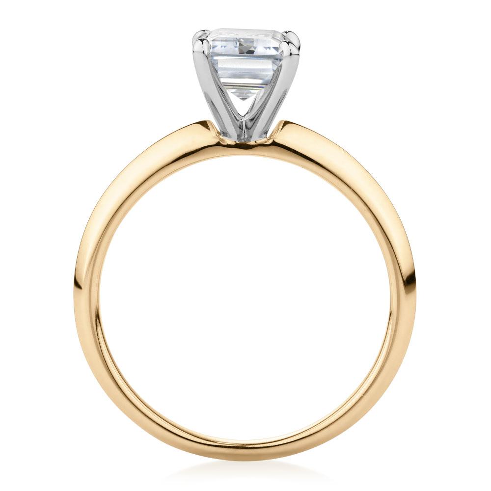 Emerald Cut solitaire engagement ring with 2.17 carat* diamond simulant in 14 carat yellow and white gold