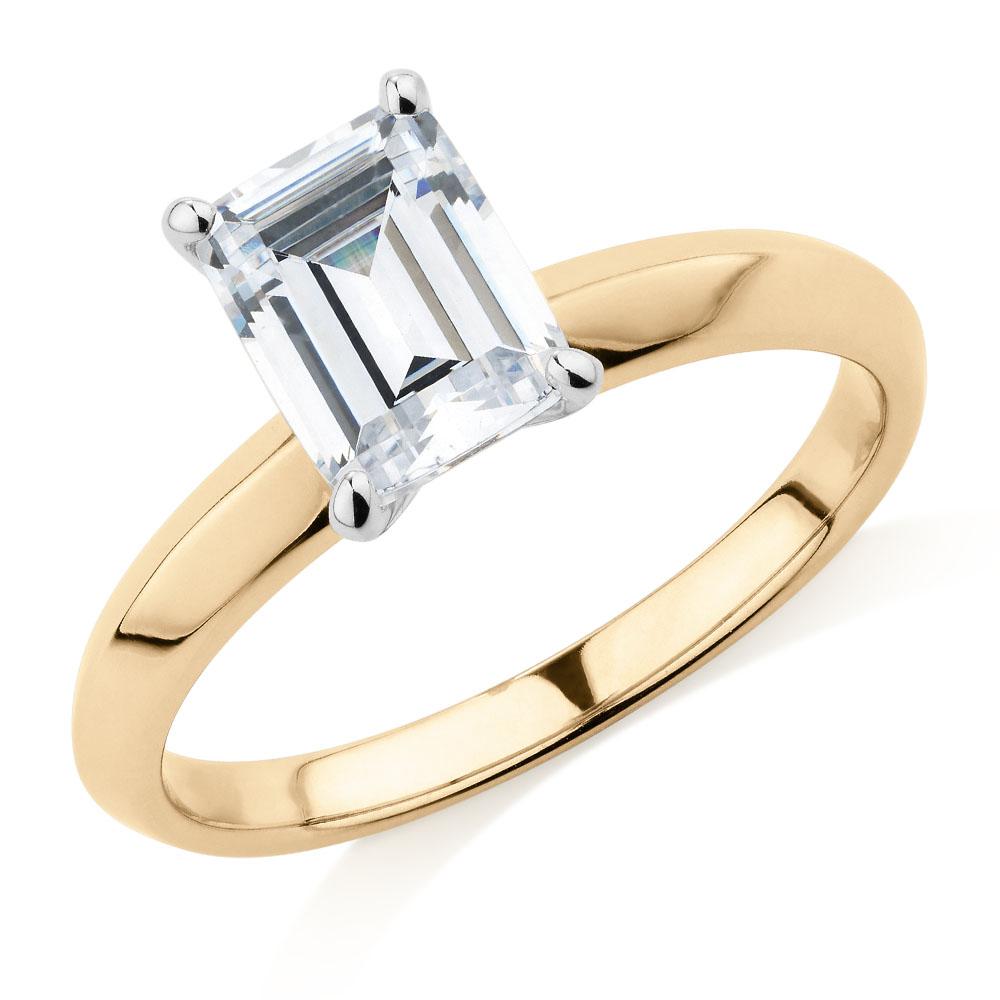 Emerald Cut solitaire engagement ring with 2.17 carat* diamond simulant in 14 carat yellow and white gold