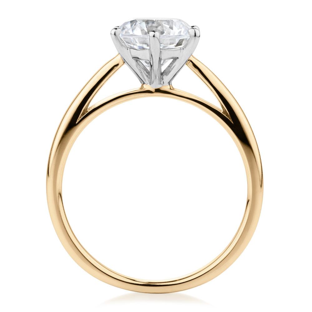 Round Brilliant solitaire engagement ring with 2.04 carat* diamond simulant in 14 carat yellow and white gold