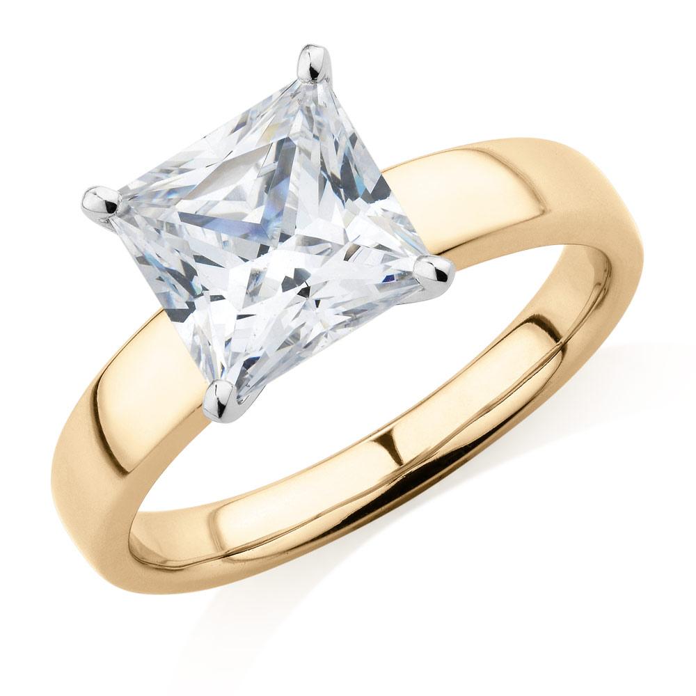 Princess Cut solitaire engagement ring with 3.01 carat* diamond simulant in 14 carat yellow and white gold