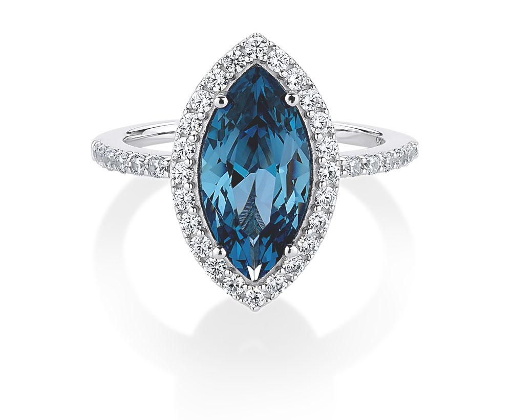 Dress ring with ceylon sapphire simulant and 0.54 carats* of diamond simulants in sterling silver